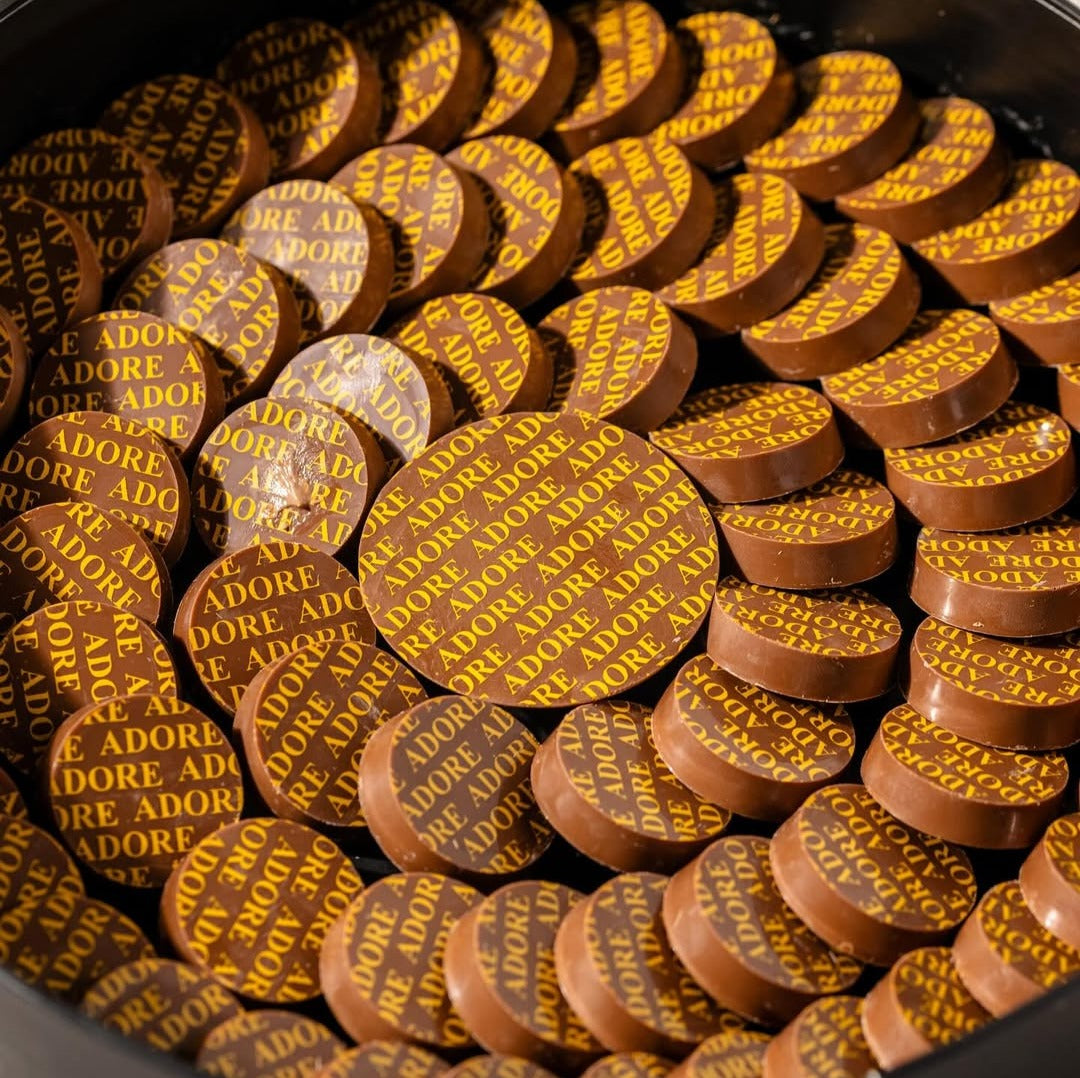 ADORE KUWAIT CUSTOM BRANDED CHOCOLATE MADE FROM CHOCOLATE TRANSFER SHEET FOR MAGNETIC MOLDS